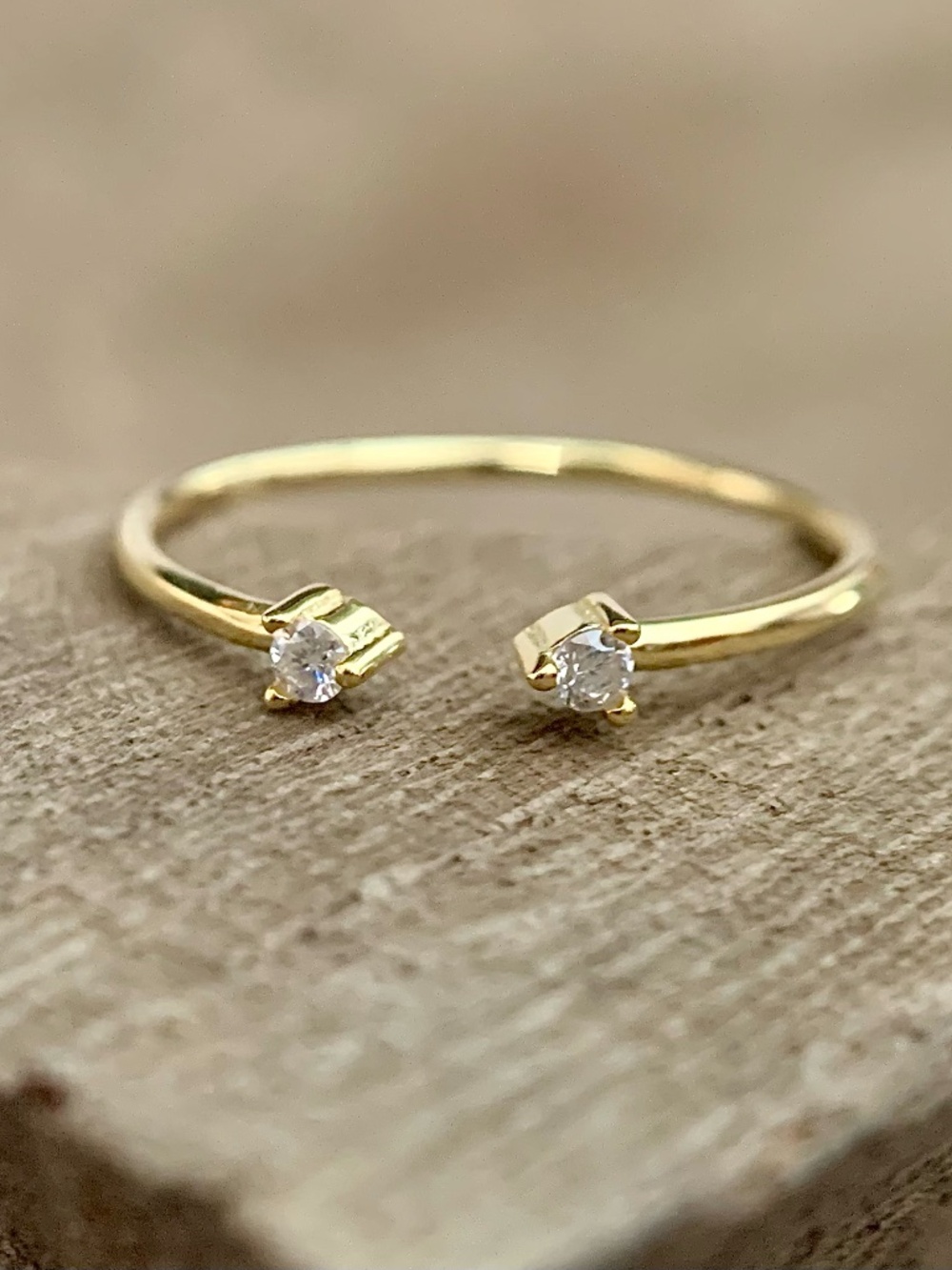 0.06CTW Open Yellow Band Ring with Two Moissanite